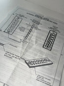 Technical drawing or blueprint with text and diagrams on a white background