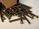 Box of brass machine screws on a white background Cardon Tools