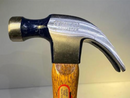 Stanley hammer with wooden handle on a gradient background